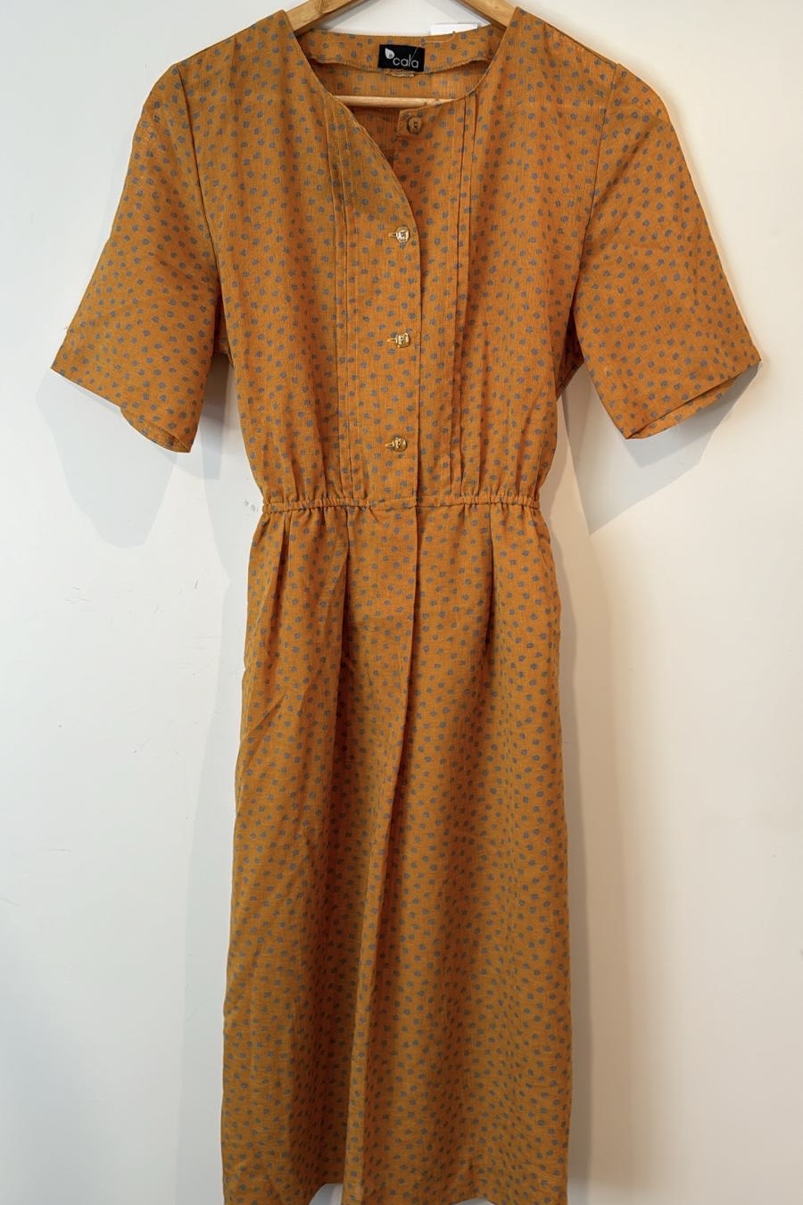 שמלת וינטג' כתומה נקודות כחולות