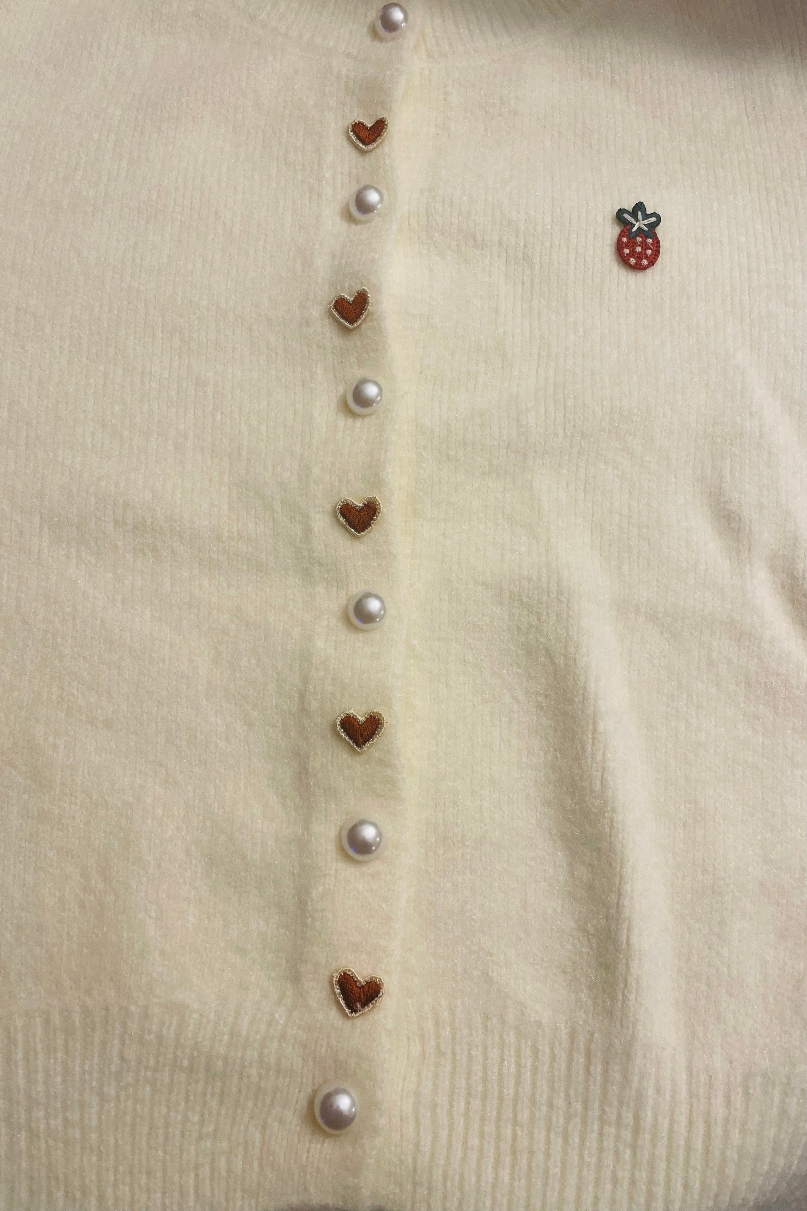 קרדיגן כפתורים וקישוט