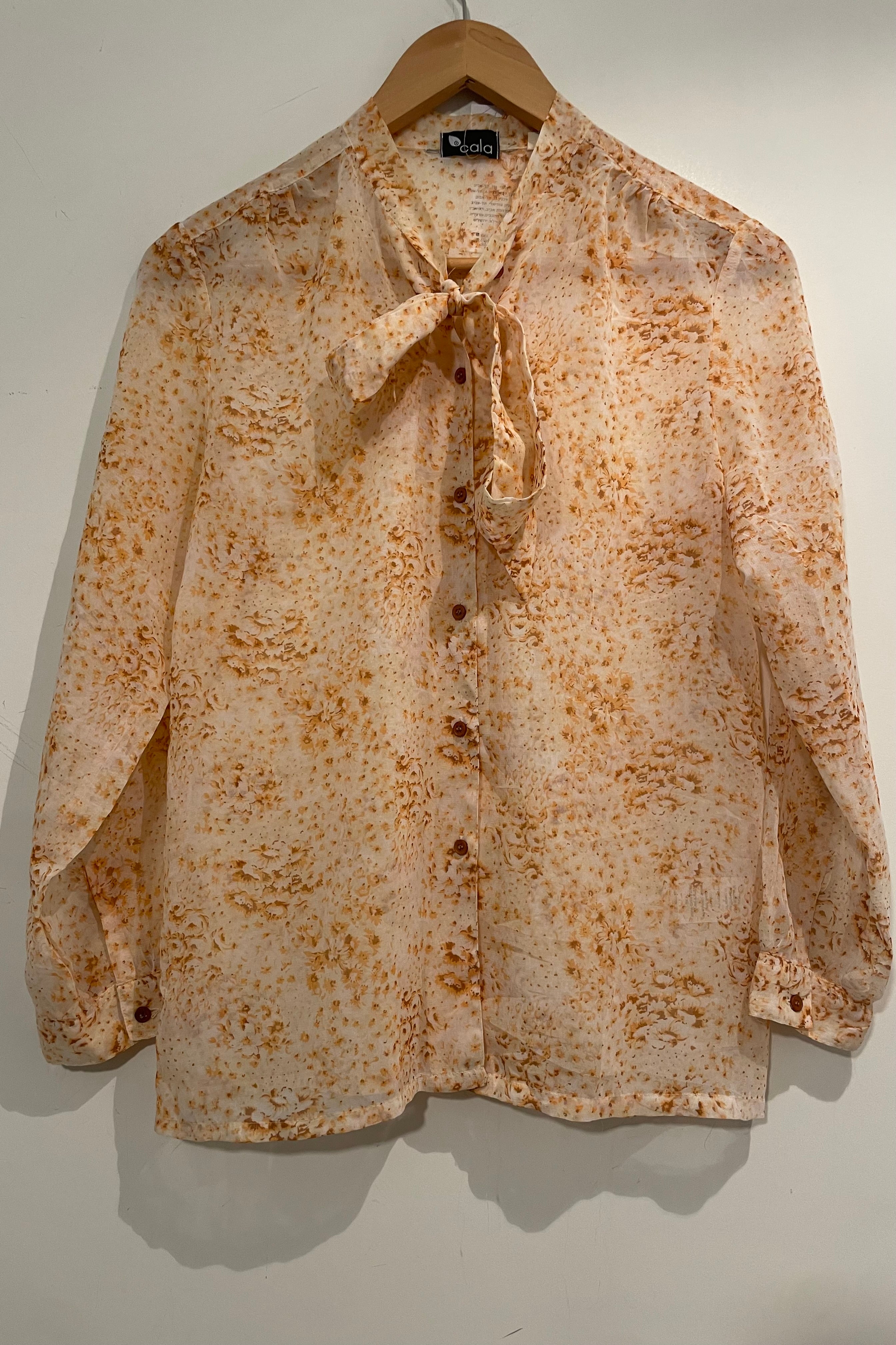 חולצת וינטג׳ שקיפות ופרחים