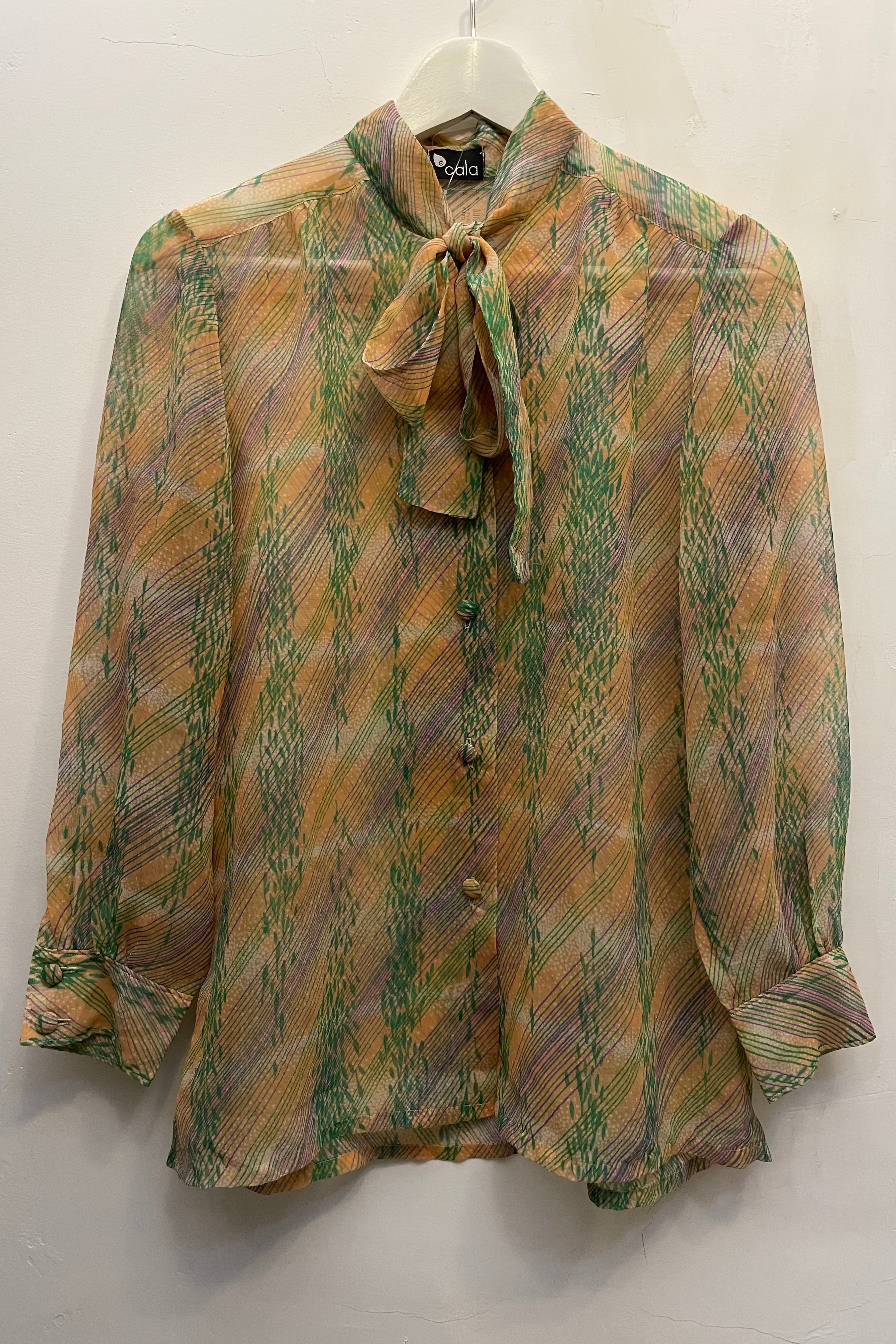 חולצת וינטג׳ עלעלים