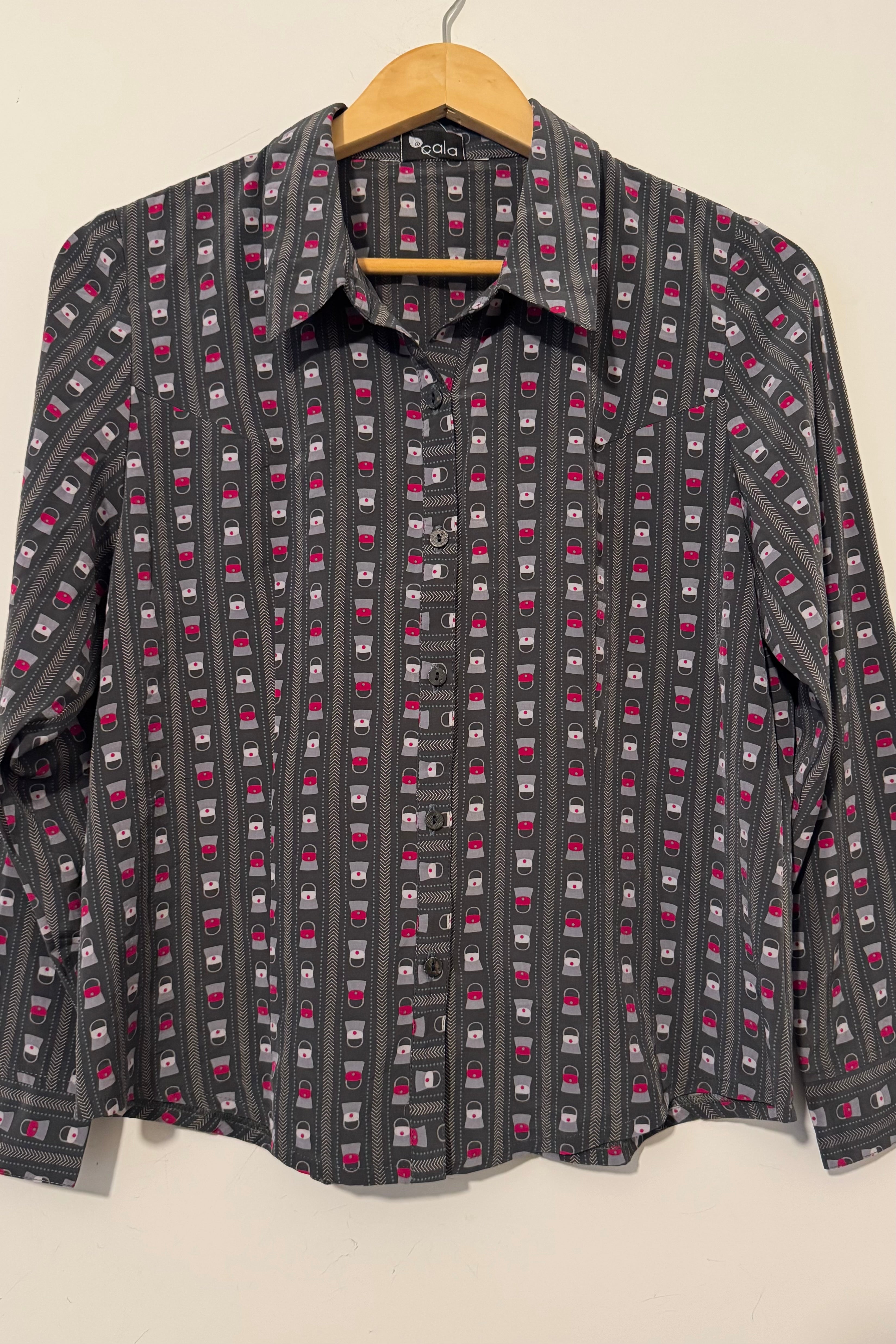 חולצת וינטג׳ תיקים קטנים