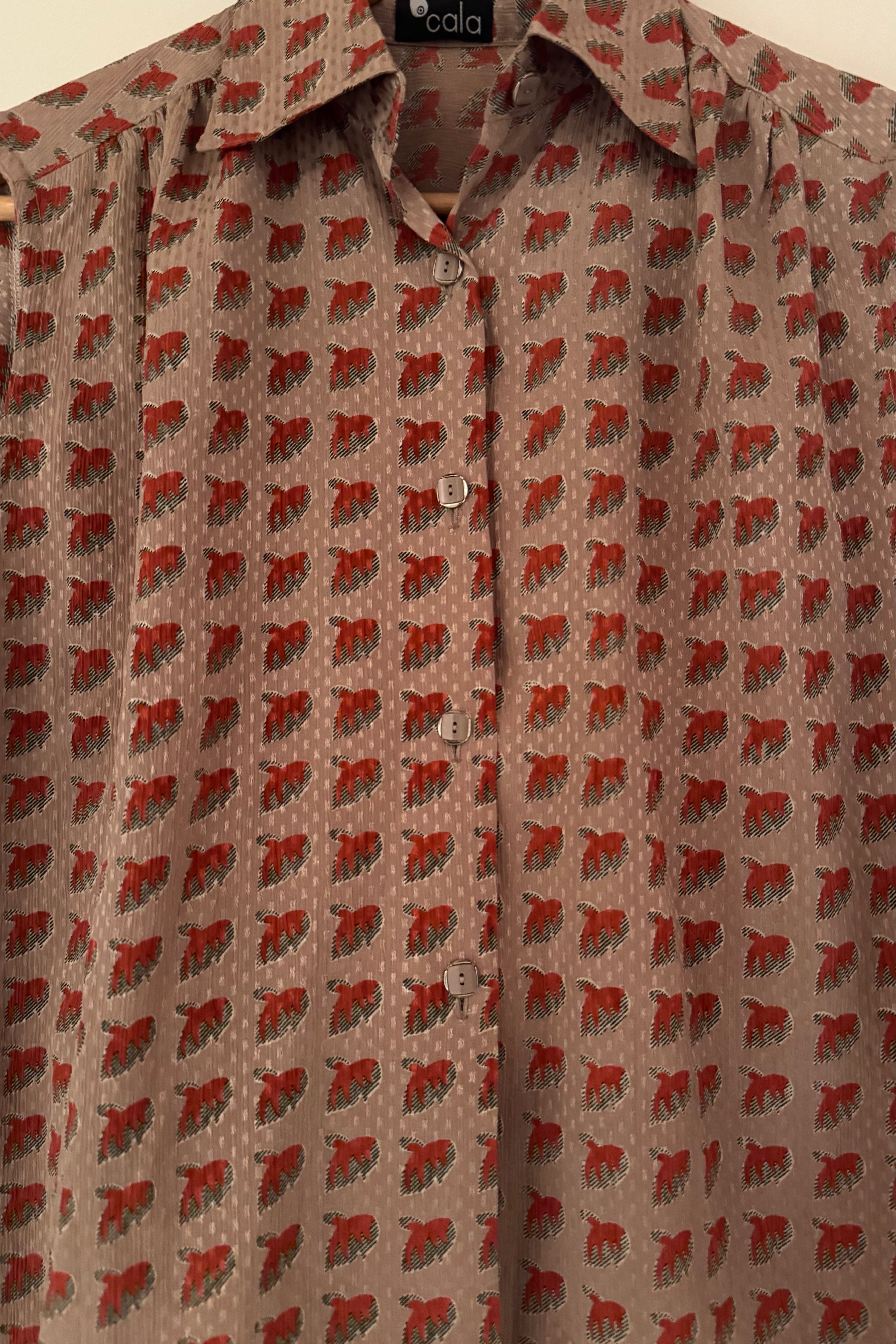 חולצת וינטג׳ נזילות