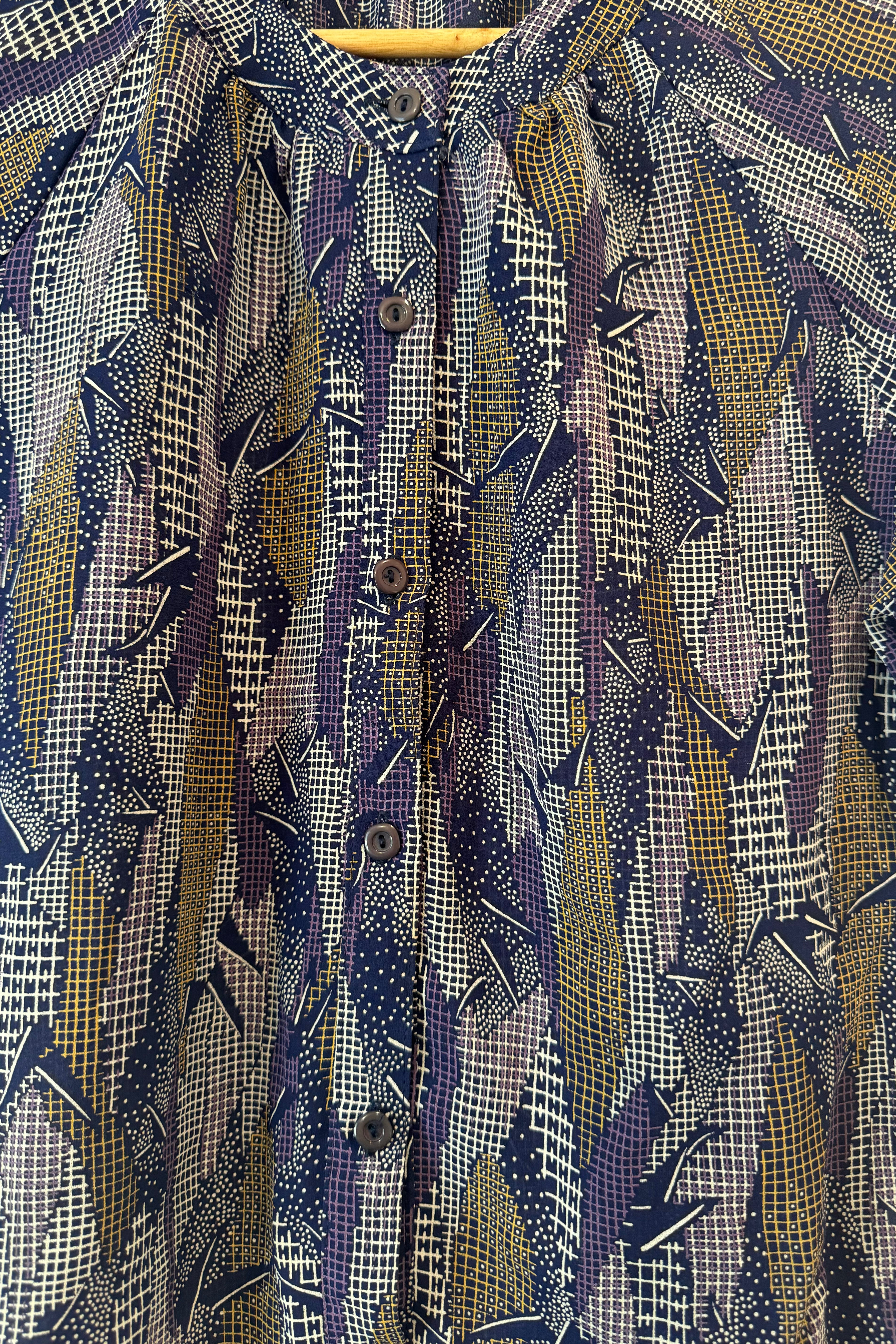 חולצת וינטג׳ דמוי קרעים