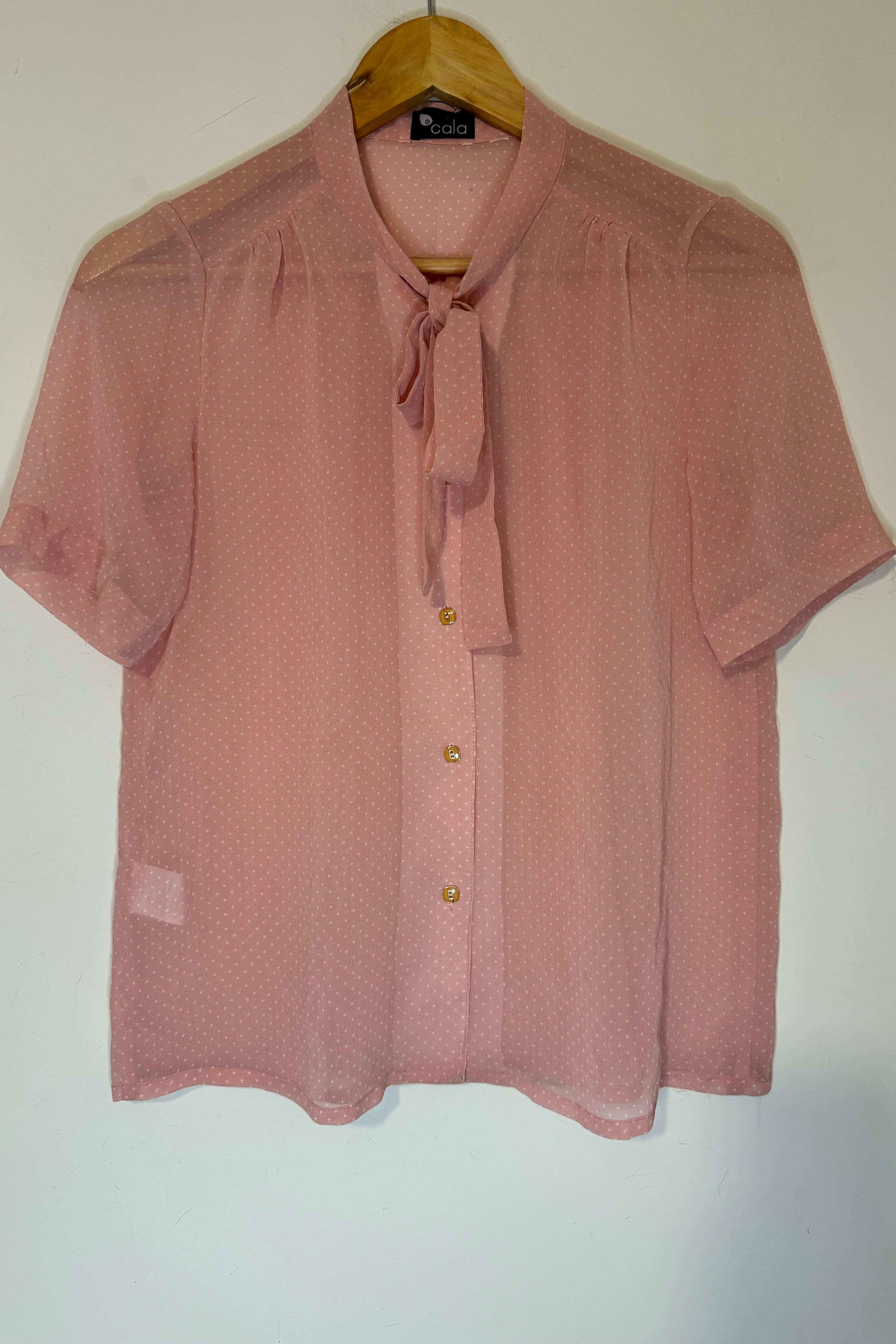 חולצת וינטג׳ ניקוד על ורוד