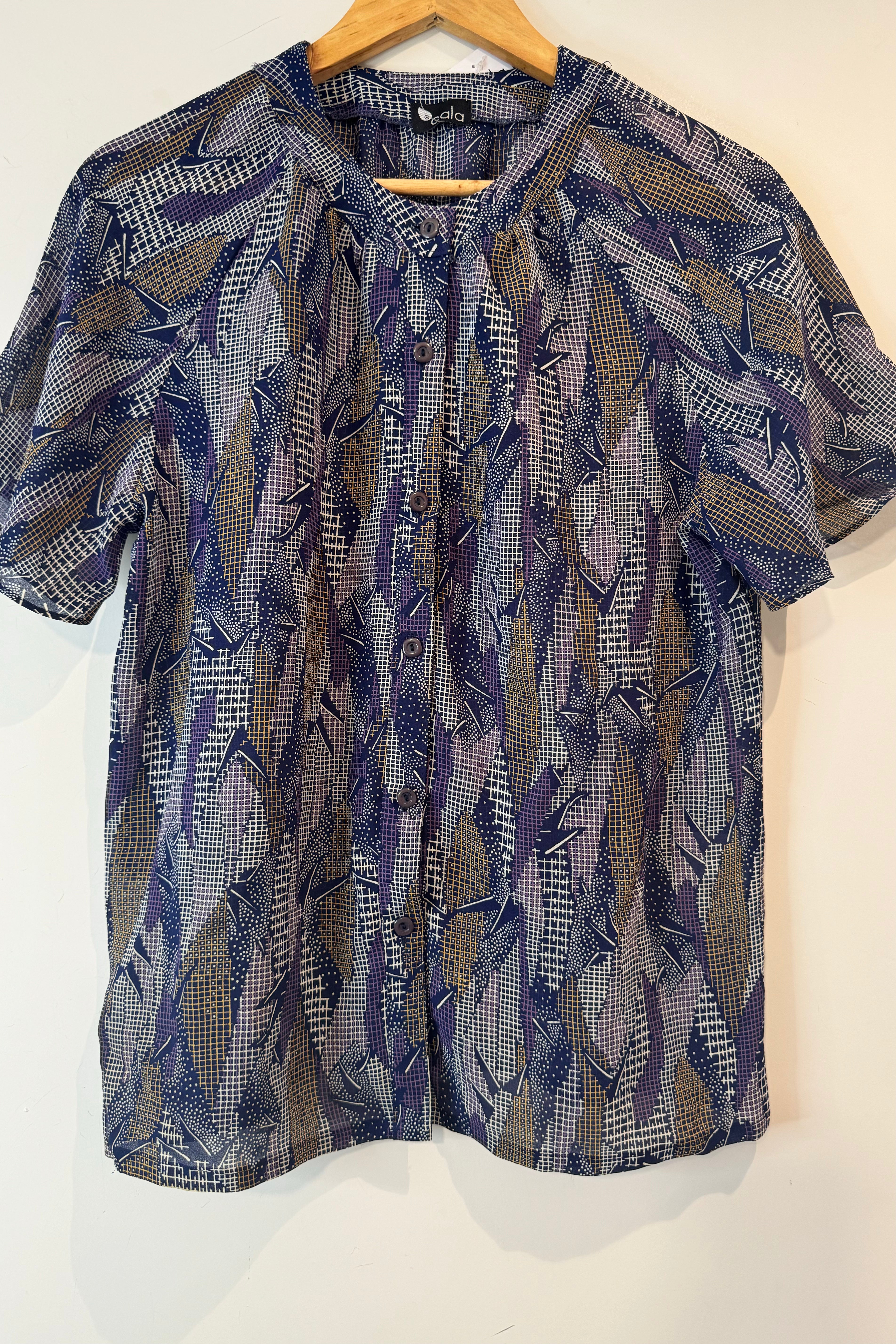 חולצת וינטג׳ דמוי קרעים