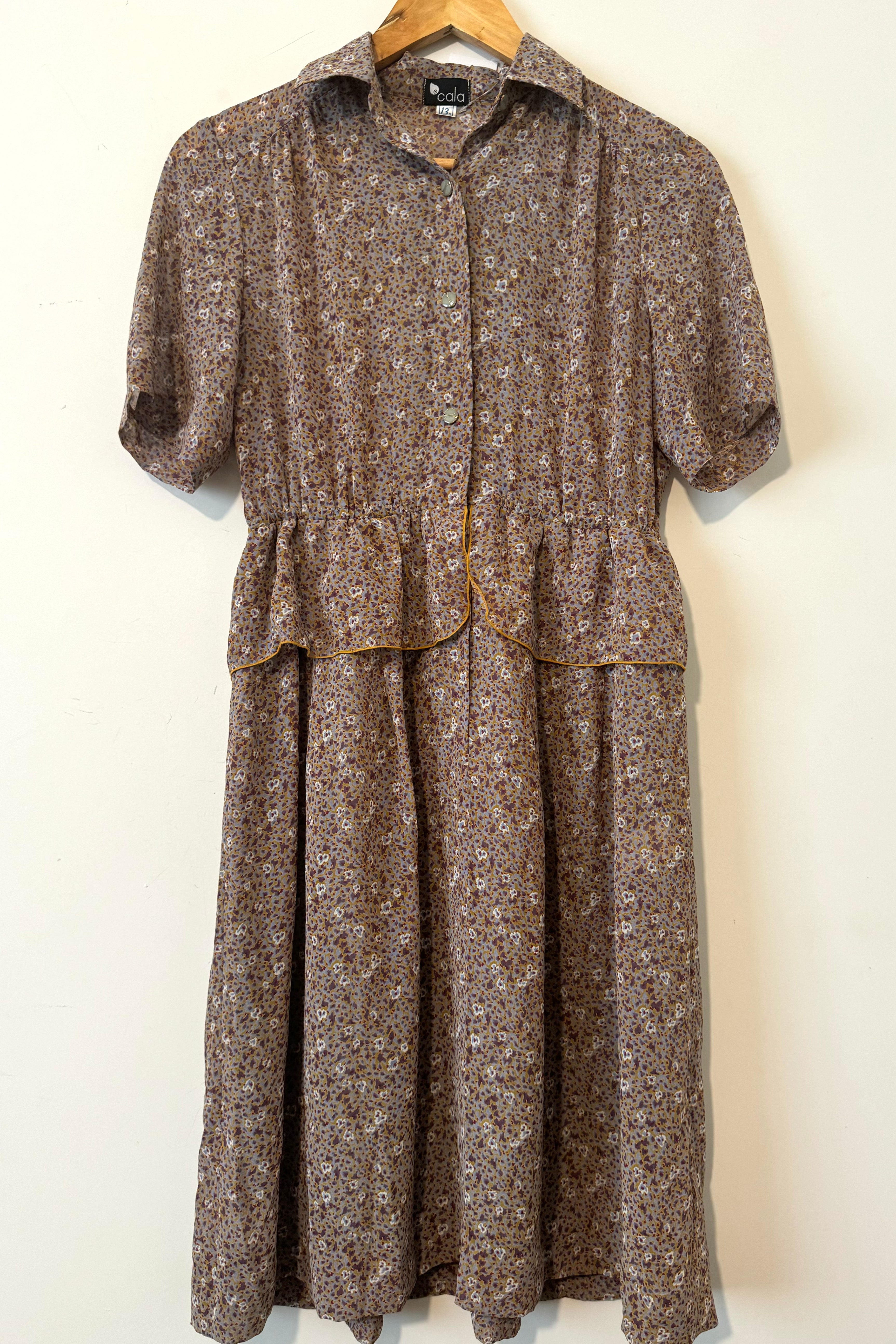 שמלת וינטג׳ כתמים ופרחים