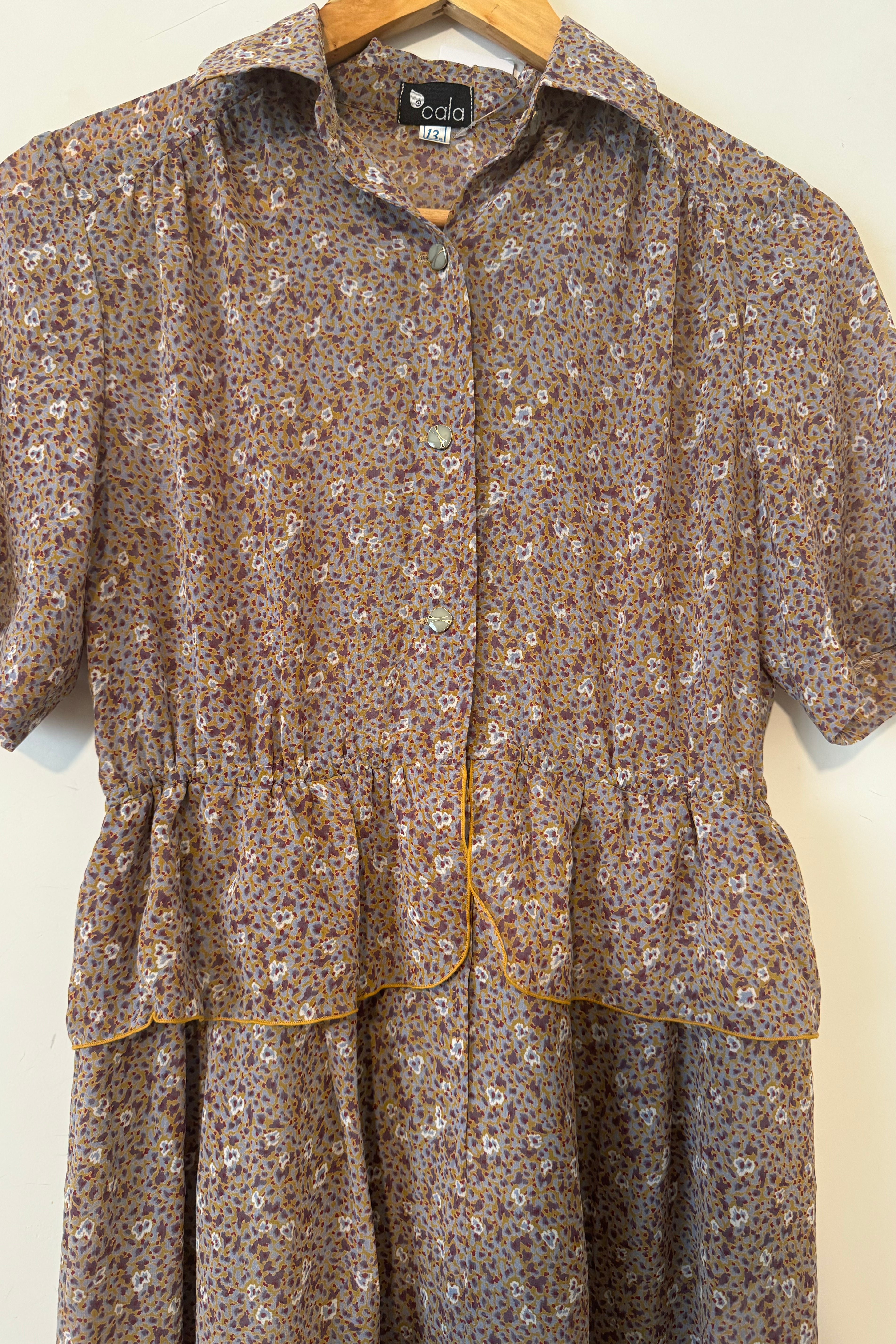 שמלת וינטג׳ כתמים ופרחים