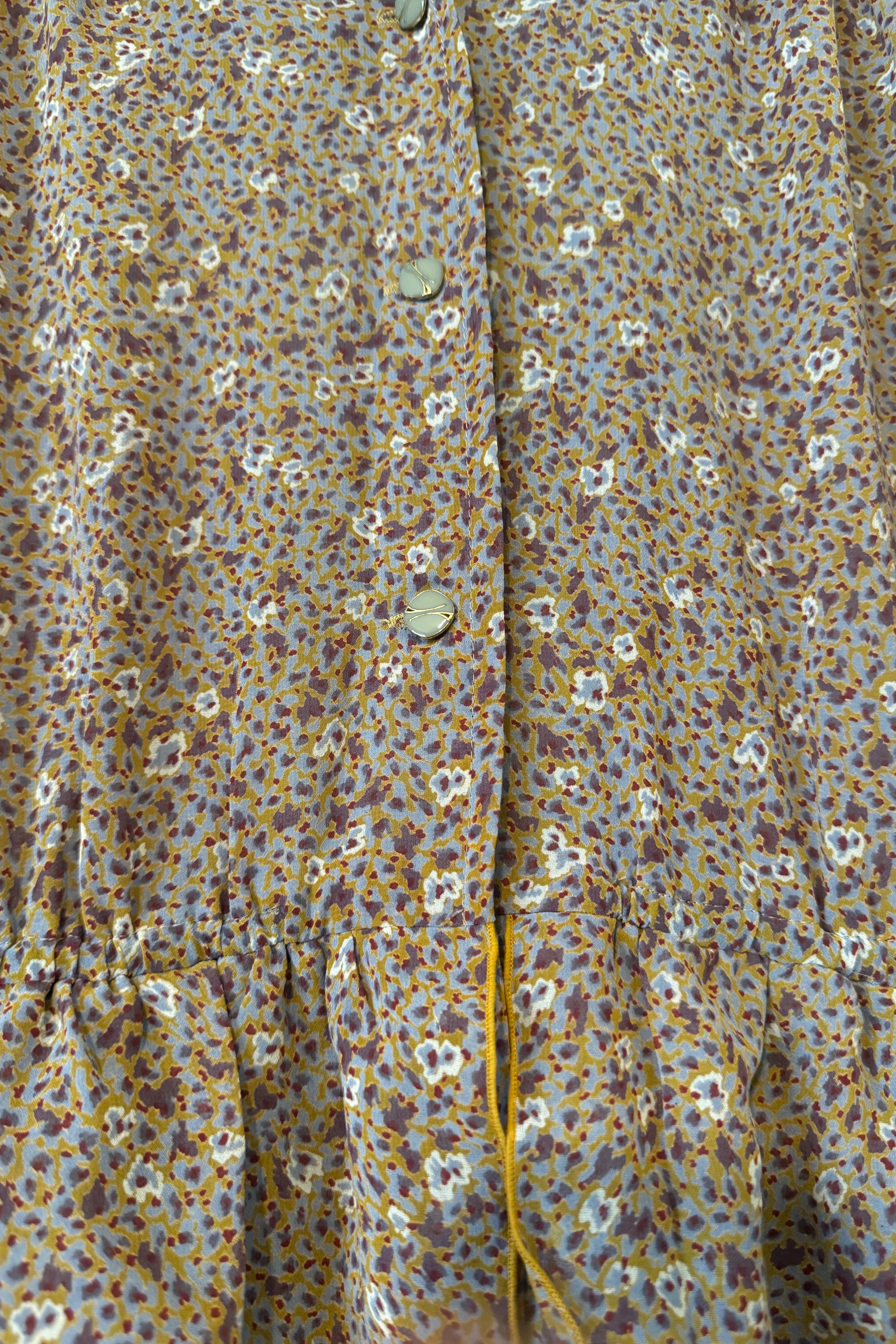 שמלת וינטג׳ כתמים ופרחים