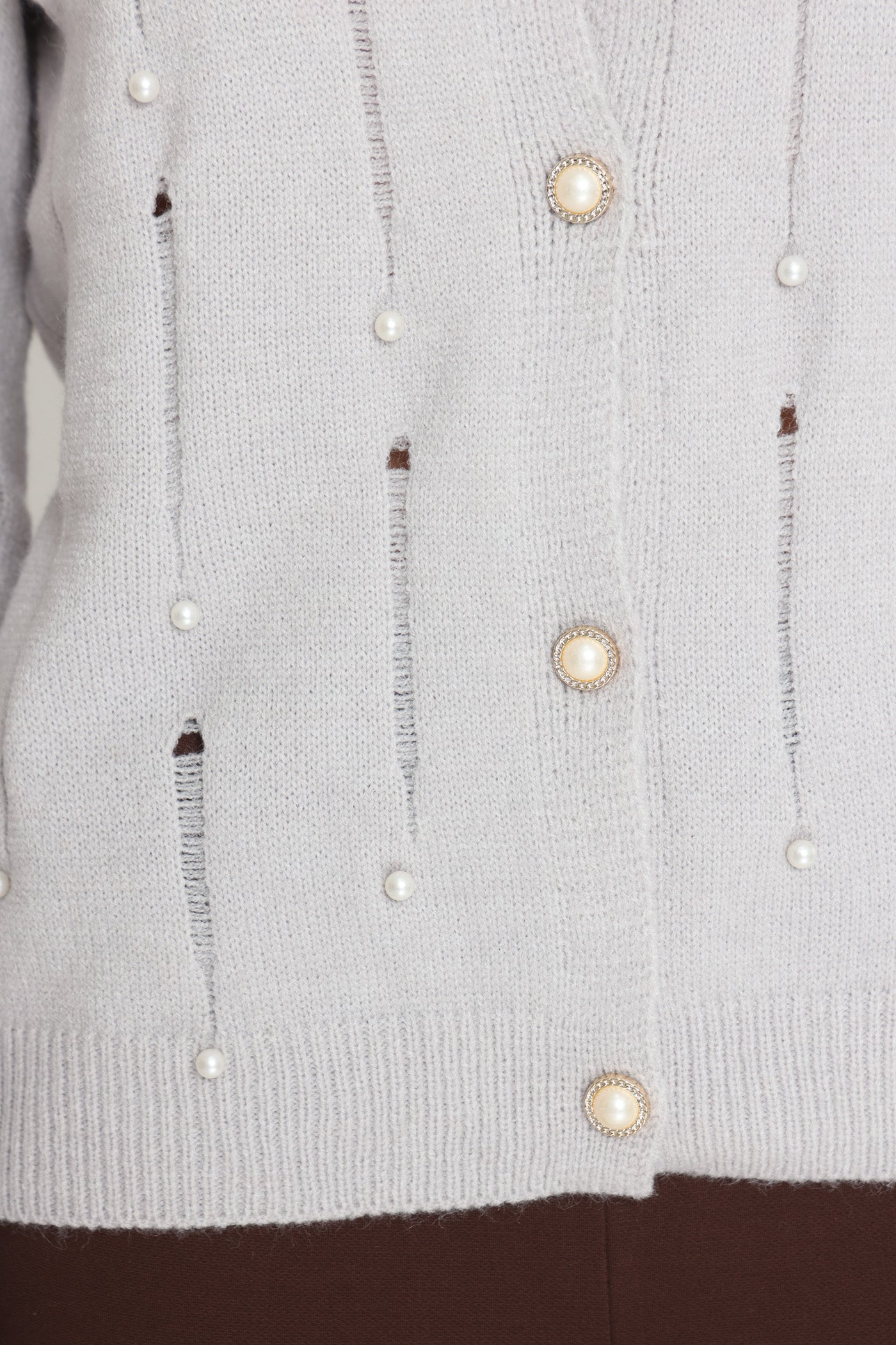 קרדיגן שקעים וחרוזים