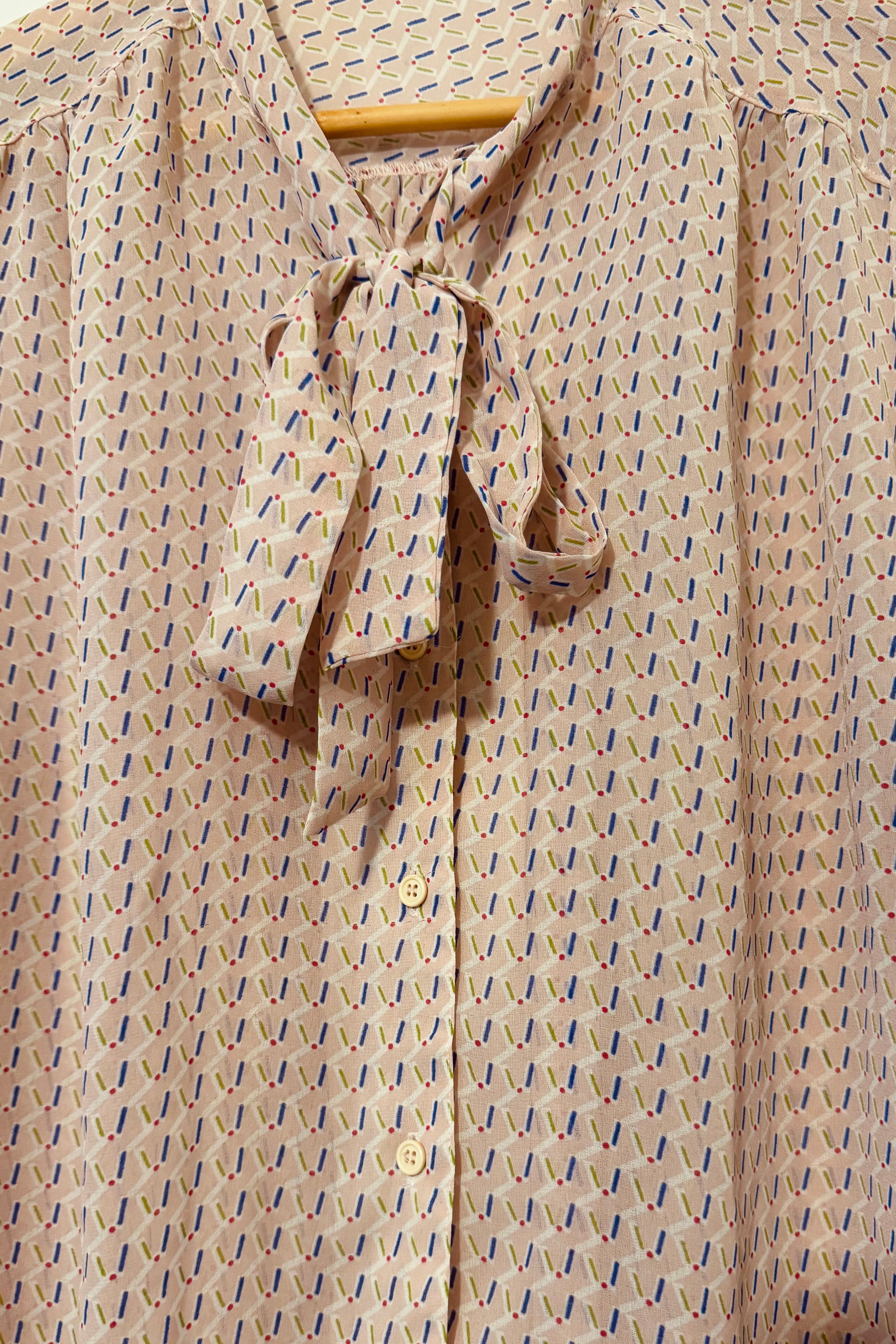 חולצת וינטג׳ מקלות