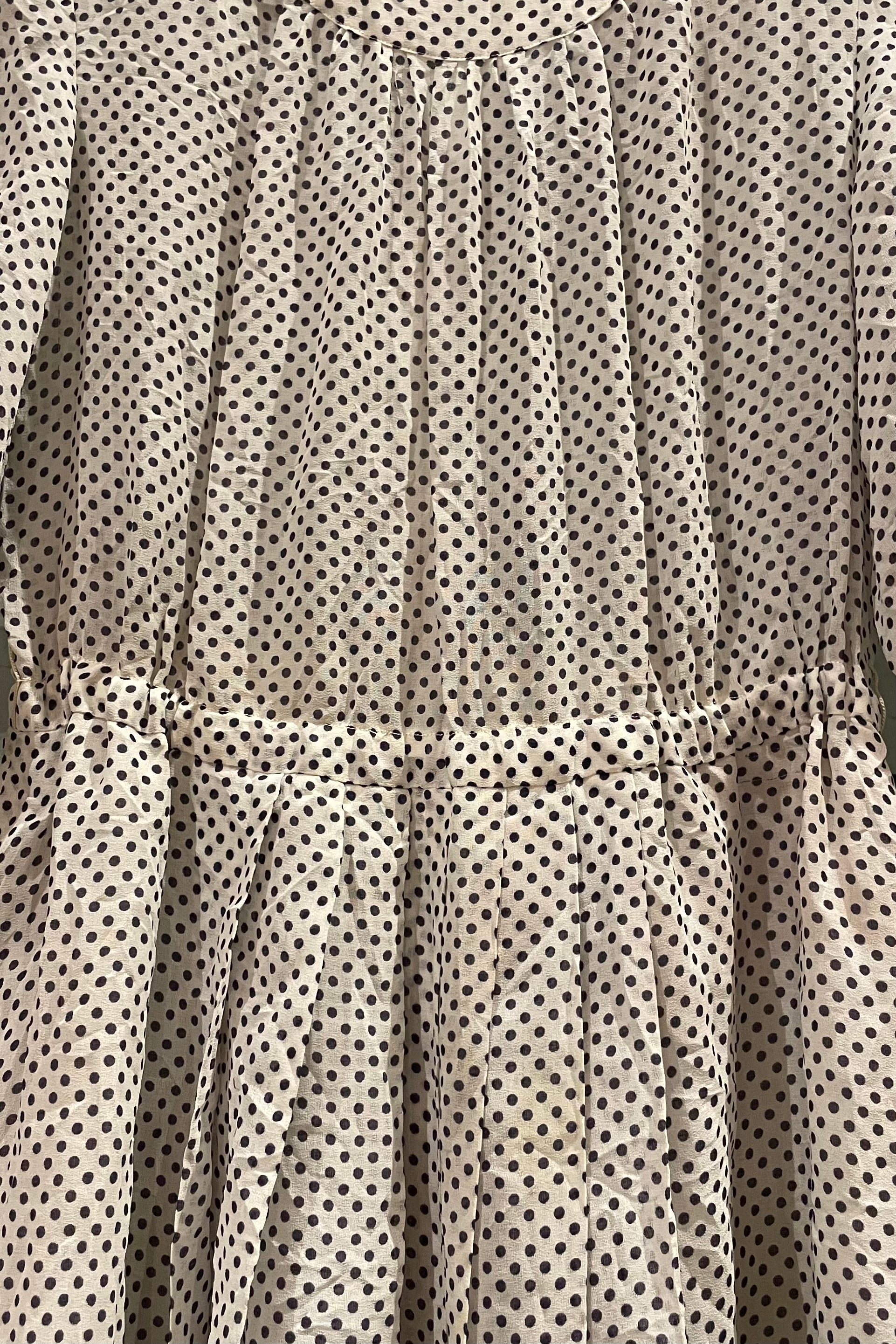 שמלת וינטג׳ ניקוד