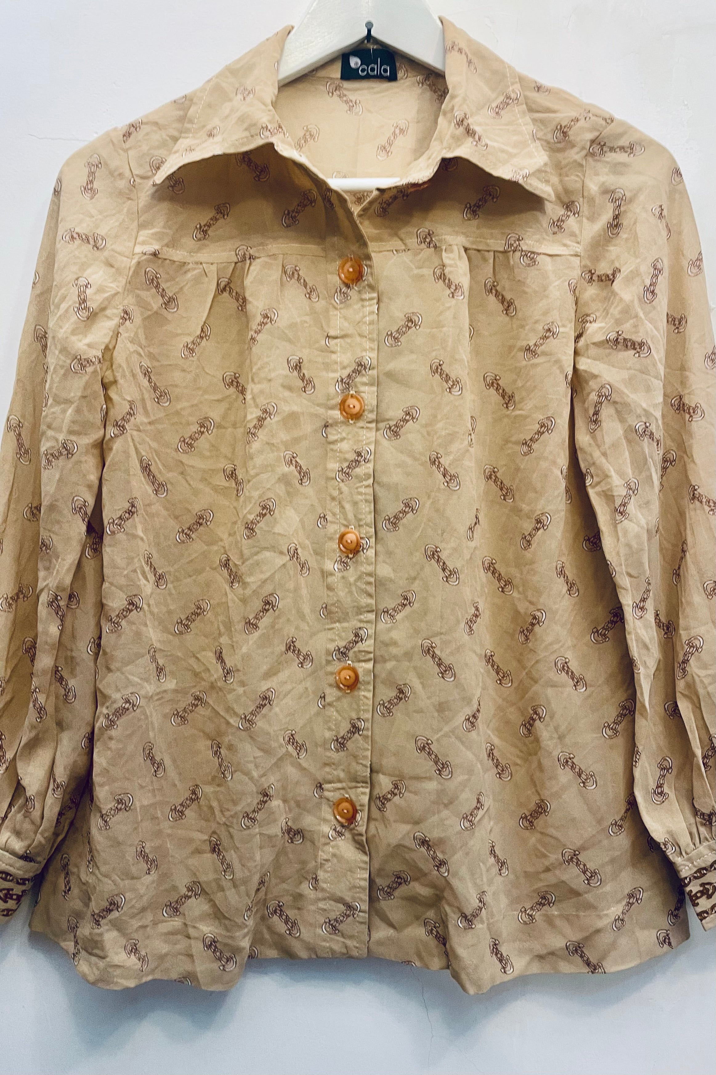 חולצת וינטג׳ לולאות